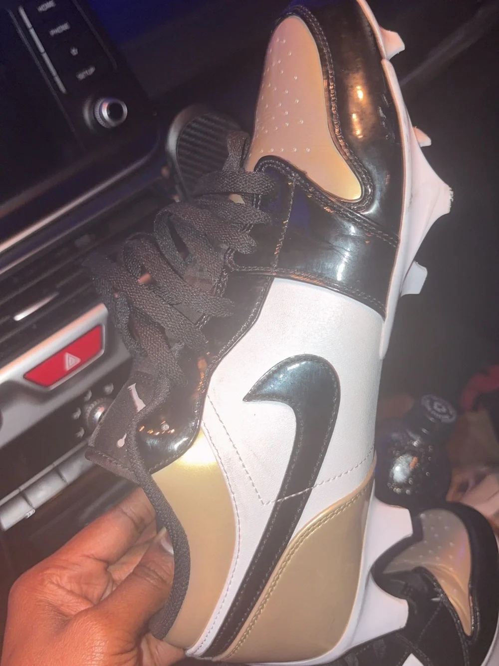 Jordan Low-Top Metallic Gold and Black Football cleats